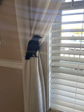 Raven curtain holdback